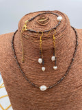 Ensemble collier, boucles et bracelet avec des perles de culture
