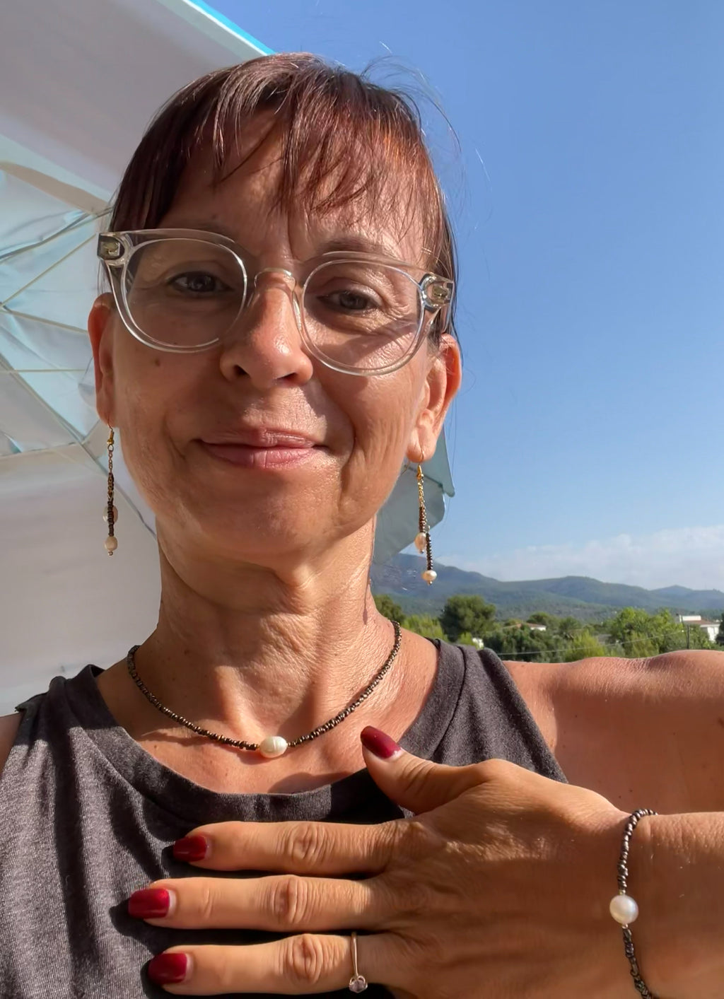 Ensemble collier, boucles et bracelet avec des perles de culture
